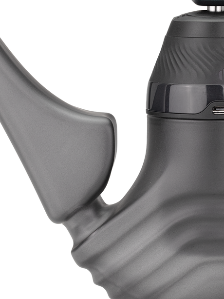 Detail view of Onyx Puffco New Proxy Wizard joint and handle, showing attachment point and ergonomic thumb rest for the Proxy vaporizer base.