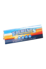 Elements 1¼ rolling papers pack with blue sunset design and 50-leaf booklet shown in angled product view