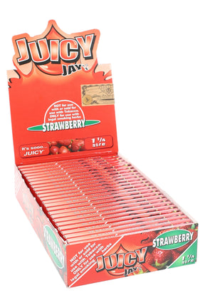 Juicy Jay’s Strawberry 1¼ flavored rolling papers display box, vivid red packaging with open display of booklets.