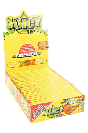 Box of Juicy Jay Pineapple rolling papers on a white background