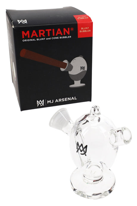 MJ Arsenal Martian blunt bubbler shown beside retail box, clear glass with pendant hook and cone-style mouth, spill-resistant design.