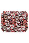 Large metal rolling tray with red and white sugar skulls and roses on black, rounded corners and raised rim for tidy herb prep.