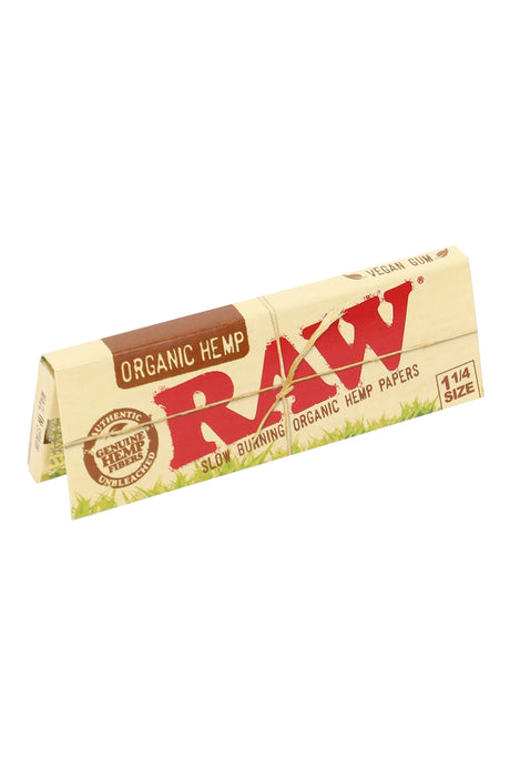 RAW Organic Hemp 1¼ rolling papers booklet with tan pack design and 50-leaf count shown in angled product view