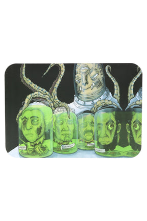 Small metal rolling tray with magnetic lid, eerie sci-fi heads-in-jars artwork on black; portable 7″ × 5″ rectangle.