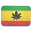 Small metal rolling tray with magnetic lid, rasta flag background with black leaf silhouette; rounded rectangle, 7″ × 5″.