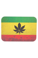 Small metal rolling tray with magnetic lid, rasta flag background with black leaf silhouette; rounded rectangle, 7″ × 5″.