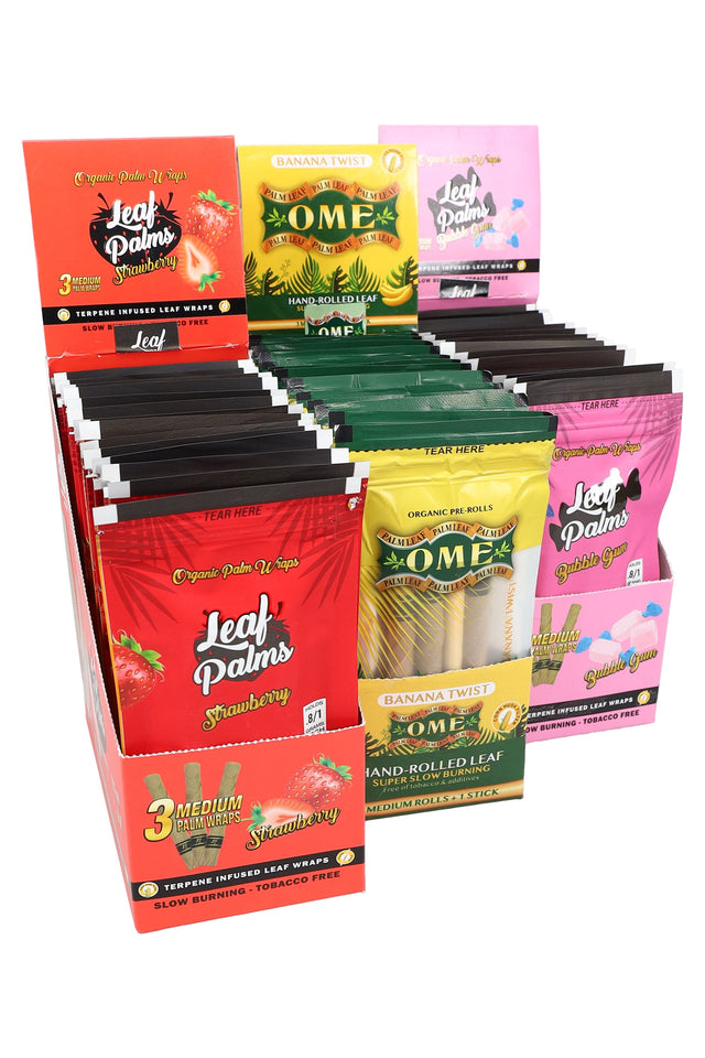 Countertop display of palm leaf pre-rolls and leaf wraps in assorted flavors, retail-ready 15-pack boxes for grab-and-go.