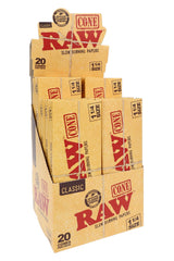 RAW Classic 1¼ pre-rolled cones 12-count display box with 20-cone packs shown open in retail counter view