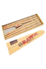 Open RAW Classic 1¼ pre-rolled cone pack with funnel-style lid and visible cones shown in close-up view