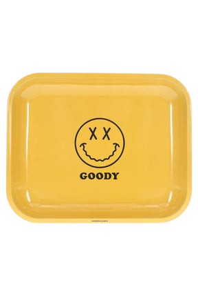 Large Goody Glass metal rolling tray with yellow graphic face print and raised edges shown in a top-down view