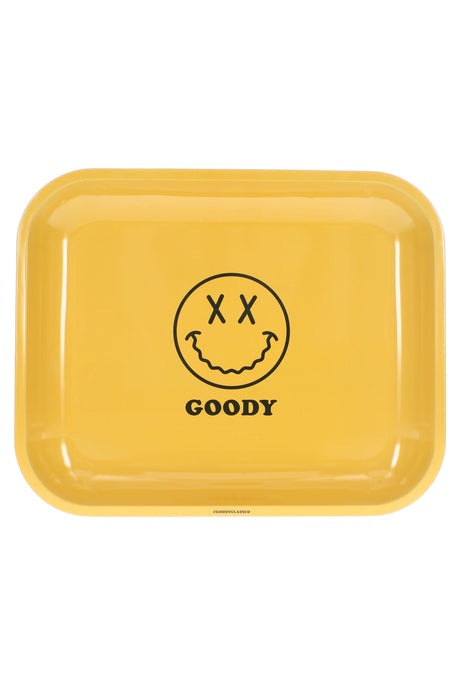 Large Goody Glass metal rolling tray with yellow graphic face print and raised edges shown in a top-down view