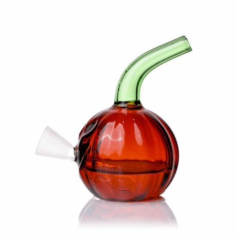 Jack O'Ripper glass bubbler rotating product view with orange pumpkin chamber and green curved mouthpiece