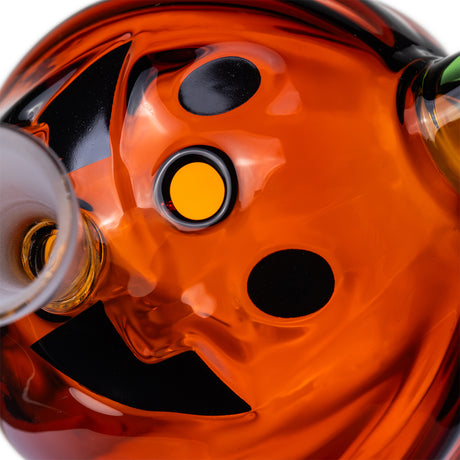 Close-up of Jack O'Ripper glass bubbler jack-o'-lantern face with black smile, eyes and circular front carb