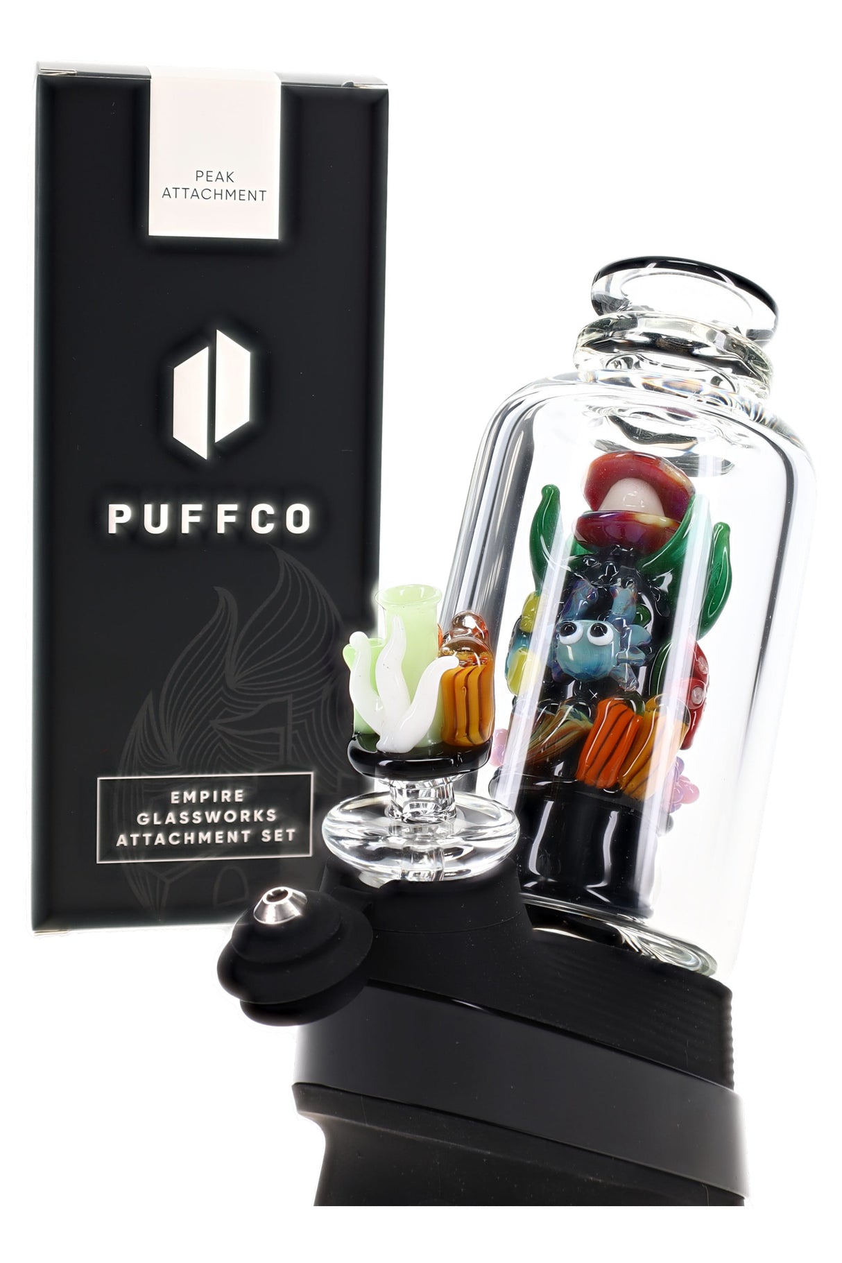 Puffco Peak setup with ocean-themed glass attachment, coral reef carb cap, and clear curved mouthpiece