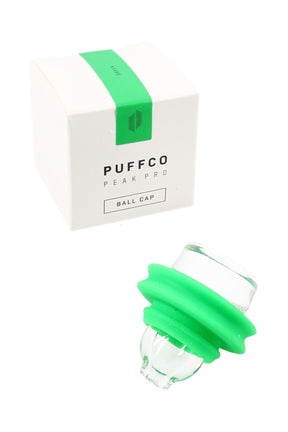 Puffco Peak Pro ball cap with green silicone seal and clear glass top, shown beside branded retail box for the accessory.