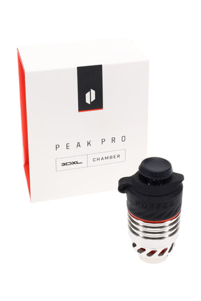 Puffco Peak Pro 3DXL chamber beside retail box, black and silver XL ceramic bowl assembly with orange accent for longer concentrate sessions.