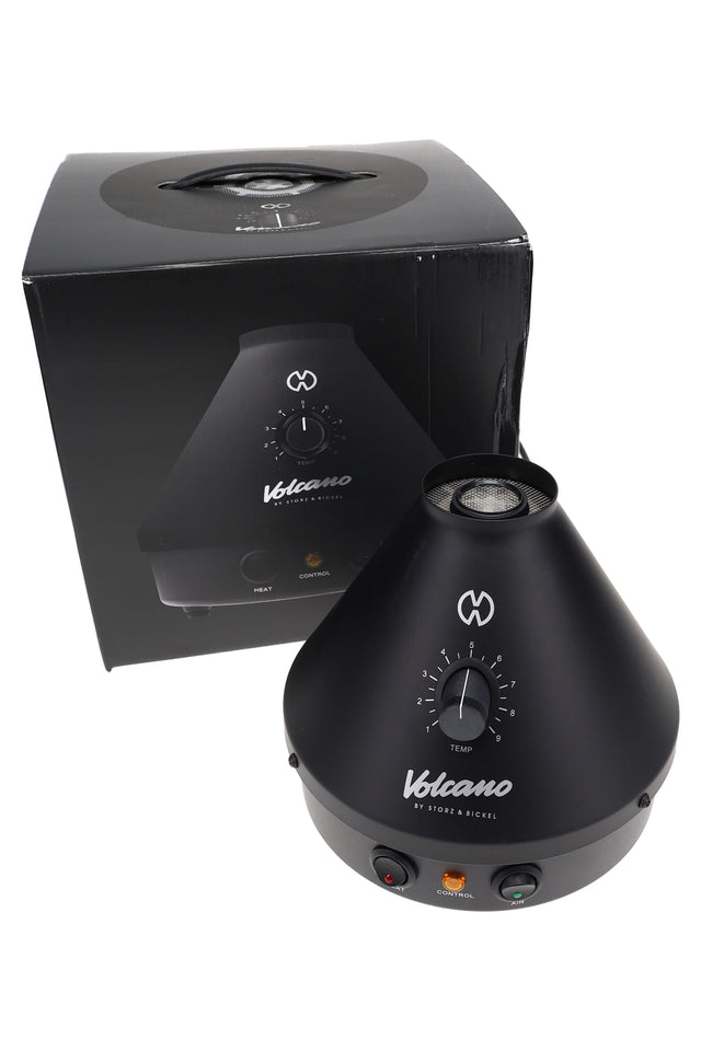 Storz & Bickel Volcano Classic vaporizer in Onyx Black with retail box, analog temperature dial and balloon outlet visible on top.