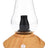 Zenco Uno desktop vaporizer in wood finish with clear glass cup and black diffuser, compact auto-fill “vapor by the glass” device.