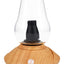 Zenco Uno desktop vaporizer in wood finish with clear glass cup and black diffuser, compact auto-fill “vapor by the glass” device.