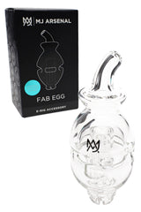 Fab Egg Pivot attachment by MJ Arsenal beside retail box, transparent recycler glass top compatible with Pivot dab pen.