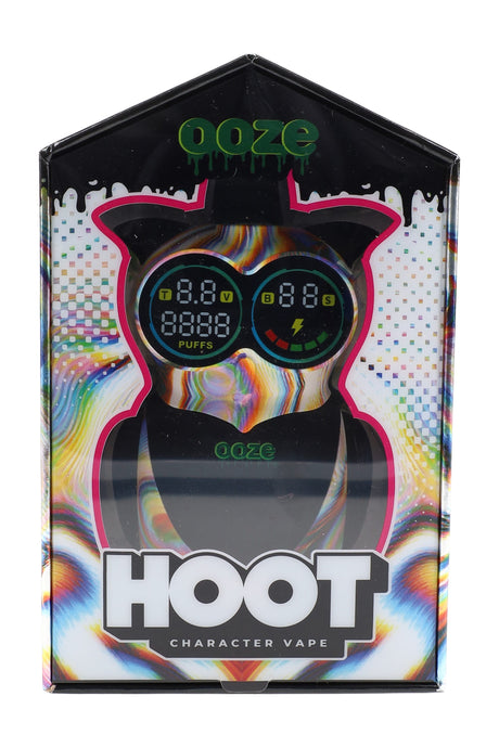 Ooze Hoot character vape in Glitch rainbow color, packaged in a window box with dual circular screens visible for voltage and puffs.
