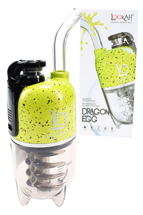 Lookah Dragon Egg electric dab rig in neon green with black splatter shell, plastic water chamber and max-fill line by box.