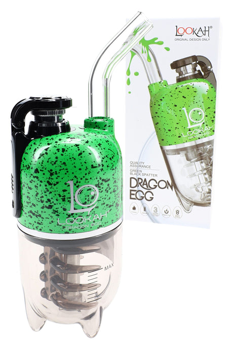 Lookah Dragon Egg electric dab rig in bright green with black splatter, ergonomic body, glass mouthpiece and perc cup by box.