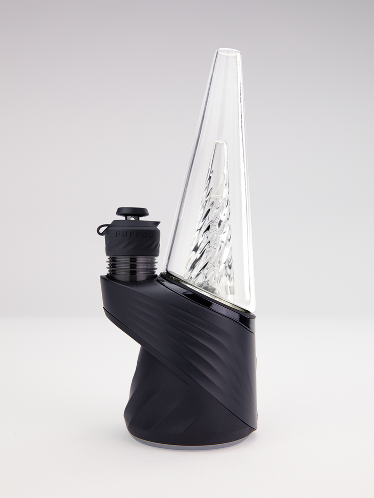 Black Puffco Peak Pro vaporizer fitted with limited edition black 3D XL chamber and clear glass cone attachment on white background