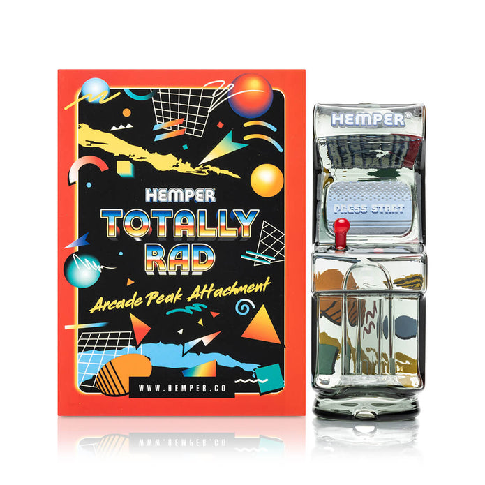 Hemper arcade Peak top and retail box on white background, collectible Puffco Peak glass top accessory view