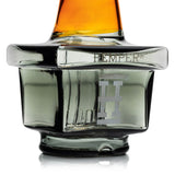 Close-up of smoked square base on Zen Bonsai Peak top showing Hemper logo and inner glass connection detail