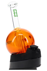 Side view orange wish ball Peak top with clear mouthpiece and green Hemper “H” logo, orb chamber shown in profile