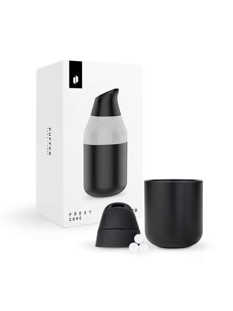 Puffco Proxy Core boxed set showing black cup, mouthpiece, and three ceramic terp pearls for concentrates
