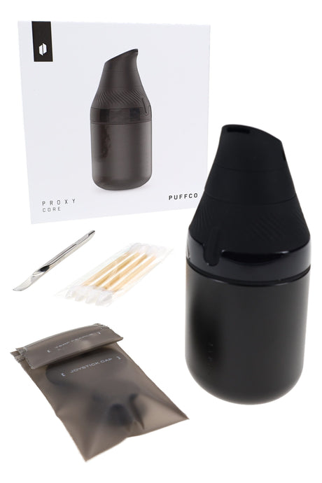 Boxed Puffco Proxy Core Kit in Onyx with device, loading accessories, and retail packaging shown together