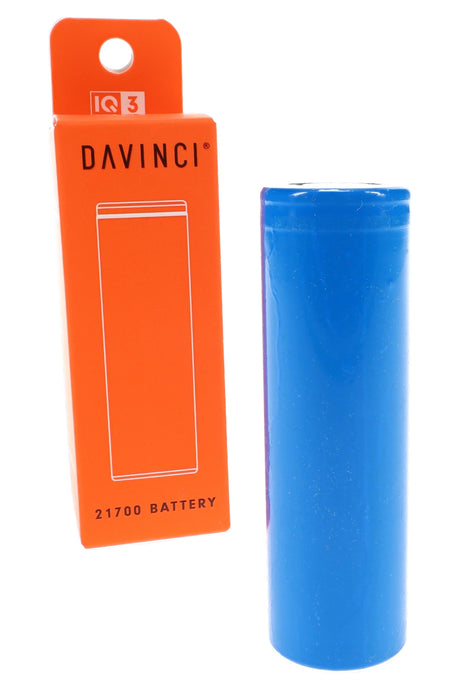 Blue DaVinci IQ3 21700 replacement battery beside orange retail box for portable vaporizer accessory listing