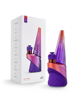 Puffco Peak Pro 3DXL Plasma e-rig in purple and orange beside its white retail box