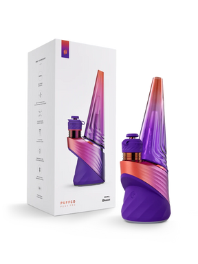 Puffco Peak Pro 3DXL Plasma e-rig in purple and orange beside its white retail box