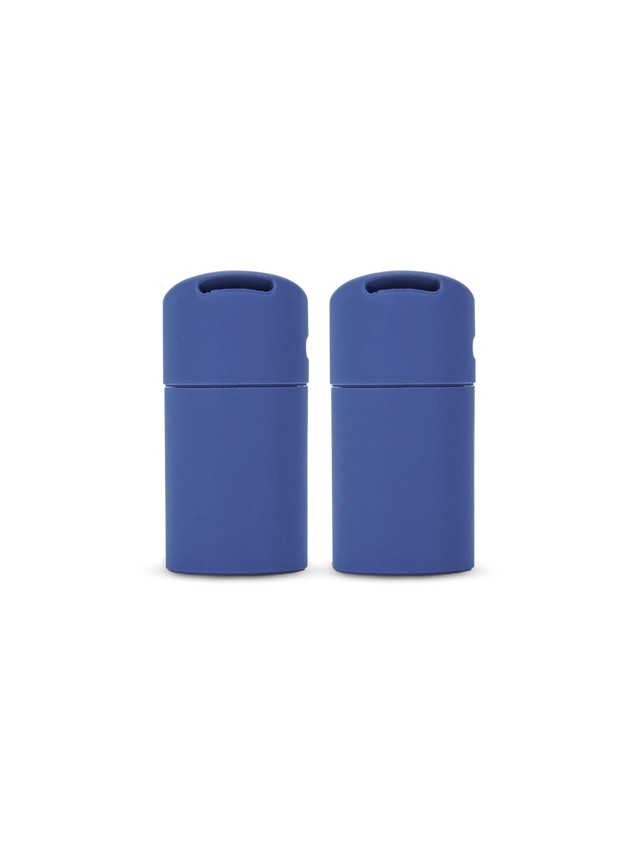 Two Sapphire blue Puffco Pivot mouthpieces standing side by side with rounded caps and wide openings