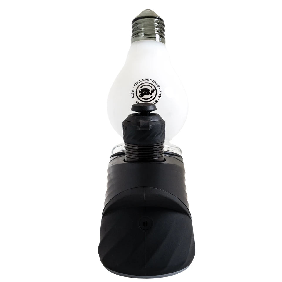 Chamber-side view of a black Puffco device with the white BigFun! Lightbowlb Peak Top behind the chamber
