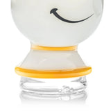 Close-up of the HEMPER Tea Cup Peak Top showing its smiling face, yellow-trimmed base, and clear connection