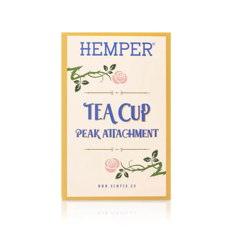 Cream HEMPER Tea Cup Peak Attachment retail box with a yellow border, rose artwork, and blue lettering