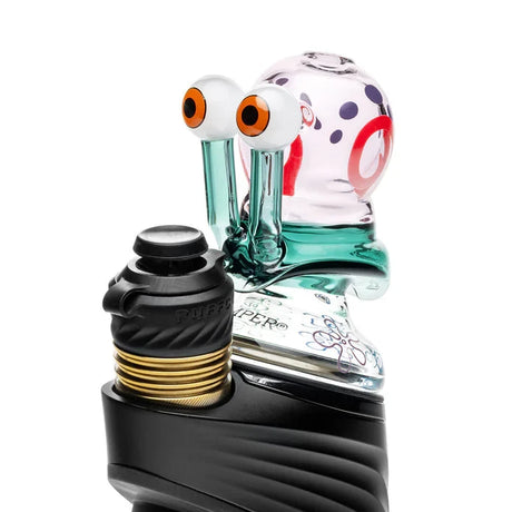 HEMPER Snail dry glass top mounted on a black Puffco device, showing orange eyes and a pink shell