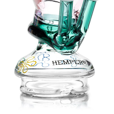 Close-up of the HEMPER Snail Dry Top showing green eyestalks, branding, and colorful flower-shaped graphics