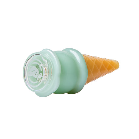 Side view of mint ice cream Peak glass top lying down with clear base and cone mouthpiece