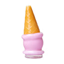 Pink ice cream Peak glass top with golden waffle cone texture on white background