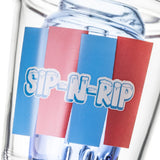 Close-up of BigFun! Sip-N-Dip Peak glass top showing red-blue SIP-N-RIP graphic over the blue inner chamber