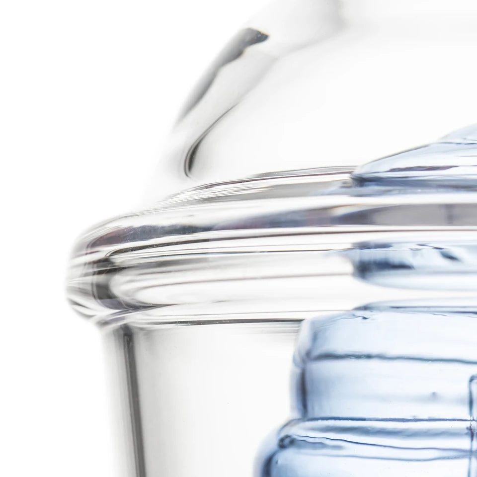 Close-up of BigFun! Sip-N-Dip Peak glass top thick clear rim, domed lid styling and blue inner glass
