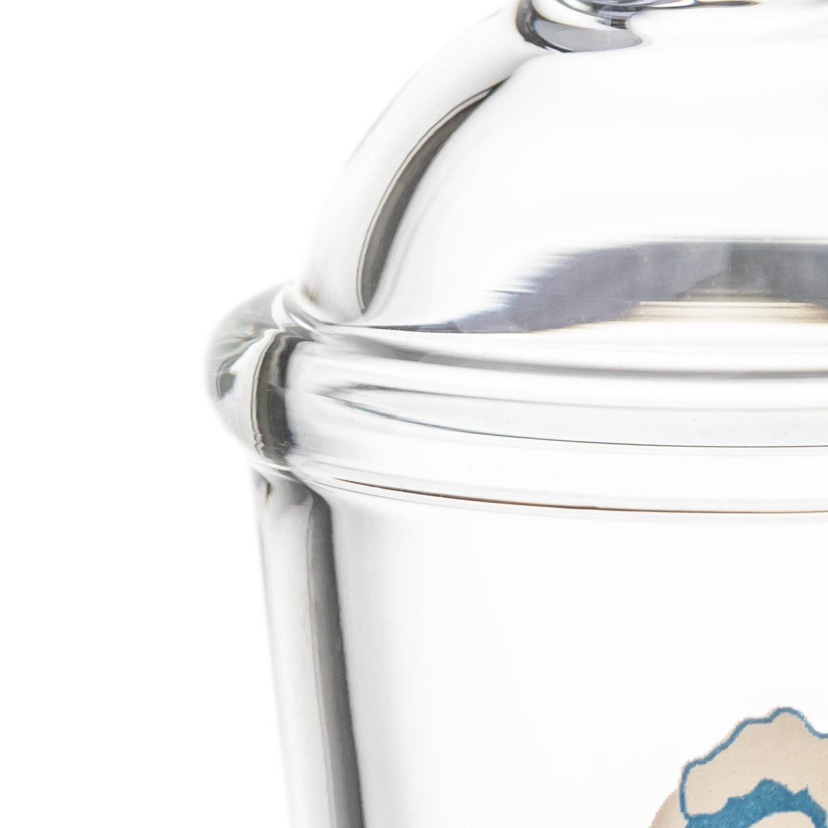 Close-up of BigFun! Sip-N-Dip Pivot glass top showing thick clear glass rim and domed upper chamber