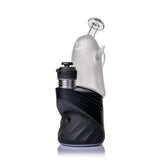 MJ Arsenal Specter Peak glass top on a black Puffco Peak, showing smiling ghost face and raised arm detail