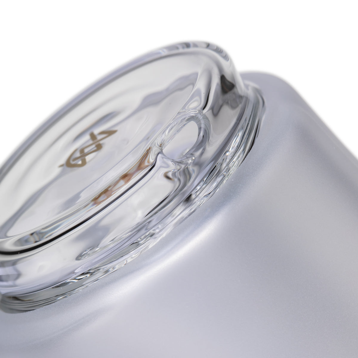MJ Arsenal Specter Peak glass top base close-up showing the clear water inlet opening and frosted body