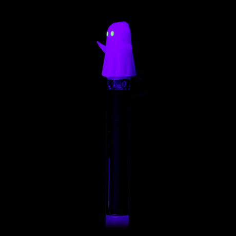 Angled UV view of MJ Arsenal Specter Pivot glass attachment with purple glow and luminous green eyes